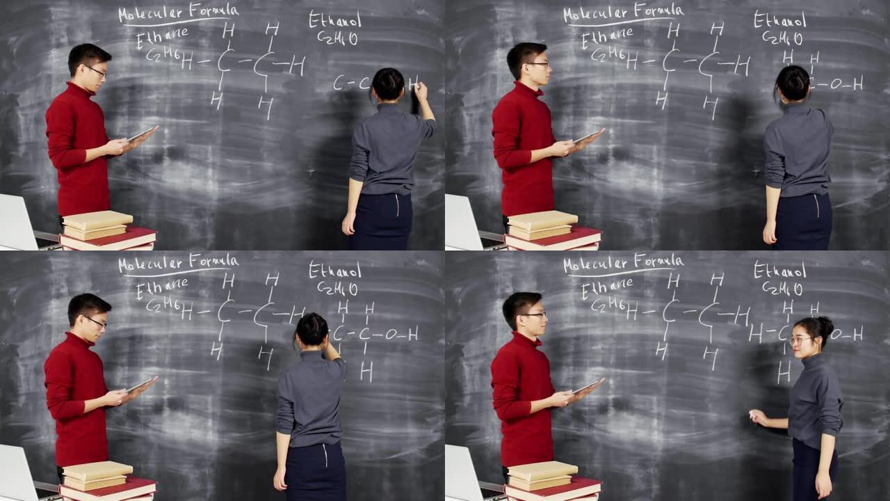 老师看学生在黑板上写化学式