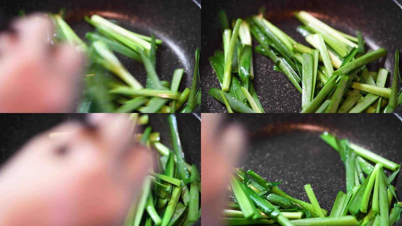 Stir-fying Chinese chive