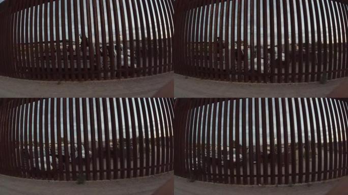 日落时分，分隔墨西哥埃尔帕索和华雷斯城的国际边境墙的视频