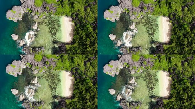 岩石岛有一个小海滩。卡拉莫恩群岛，马图卡德，菲律宾