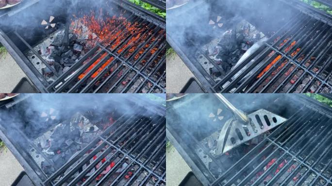 在吸烟过程的第三阶段，一名男子排空烟箱的视频，里面装满了燃烧的木炭和豆科灌木木屑。