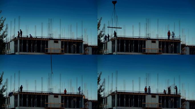 建筑工人在建筑物顶部的延时。