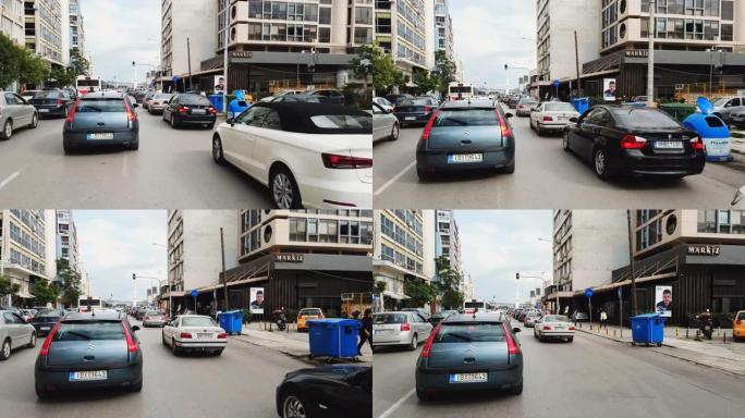 城市中的汽车交通堵塞，希腊塞萨洛尼基的道路，慢动作驾驶视点