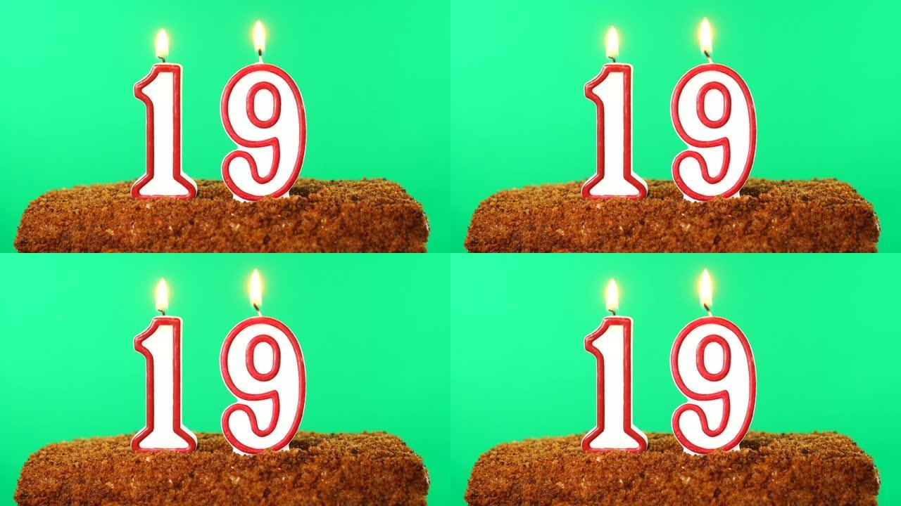 19号点燃蜡烛的蛋糕。色度键。绿屏。隔离