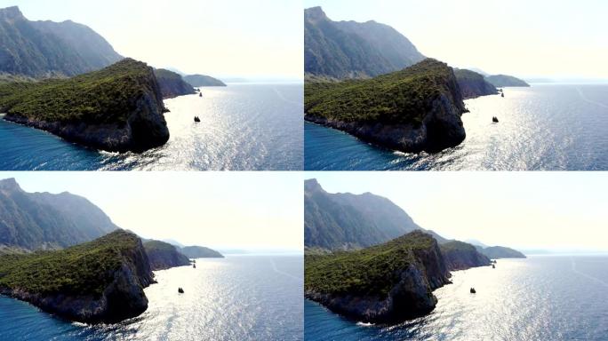 航空。从上方观看。美丽的夏日海景。希腊埃维亚岛的岩石海滩