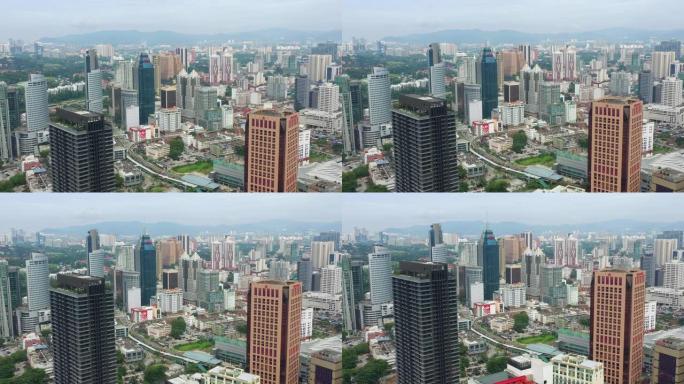马来西亚吉隆坡城市景观空中全景4k晴天飞行