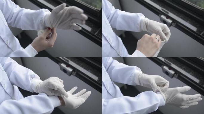 在实验室戴手套的女人。