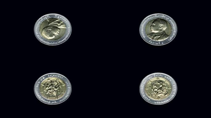 泰国纪念币 (泰铢) 在黑色背景上旋转。宏观。特写