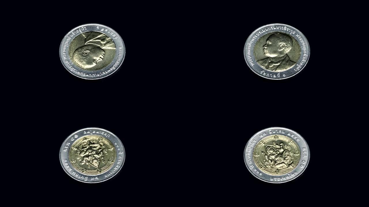 泰国纪念币 (泰铢) 在黑色背景上旋转。宏观。特写