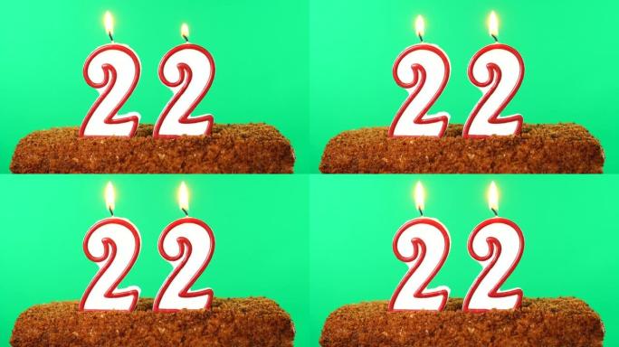 22号点燃蜡烛的蛋糕。色度键。绿屏。隔离