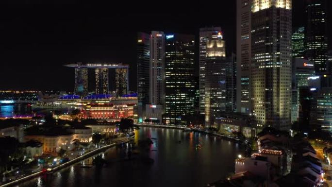 夜间照明新加坡市中心滨海湾河畔航空全景4k