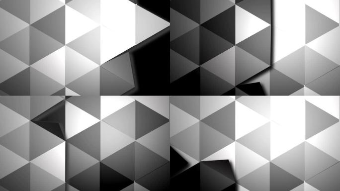 三角形的表面在不同的灰色提示中一个接一个地转动。