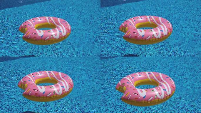 粉红色充气甜甜圈漂浮在游泳池4K