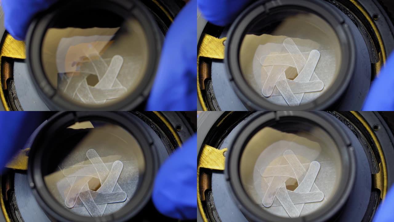 修理相机镜头拆卸镜头和机械零件特写