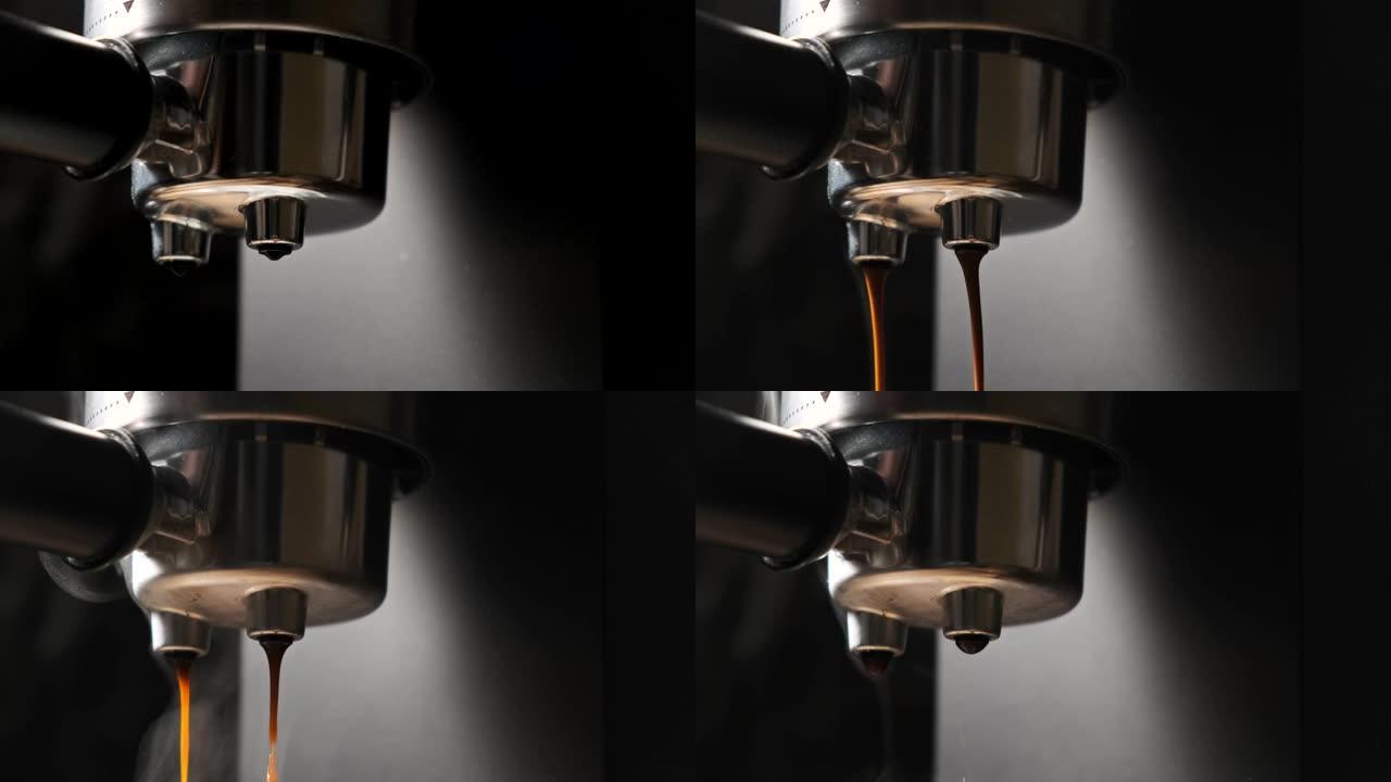 将机器中的咖啡倒入杯中。咖啡师制作浓缩咖啡的特写镜头