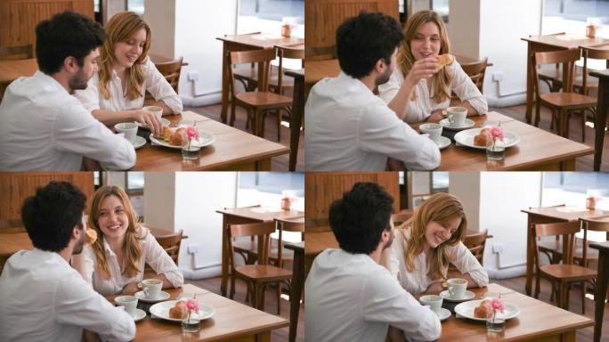 Couple having fu,in布宜诺斯艾利斯咖啡馆