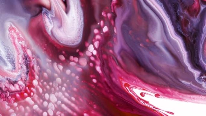 粉红色，紫色和白色有机抽象流体效果，看起来像粒子在太空中的星云中移动。视频艺术背景。