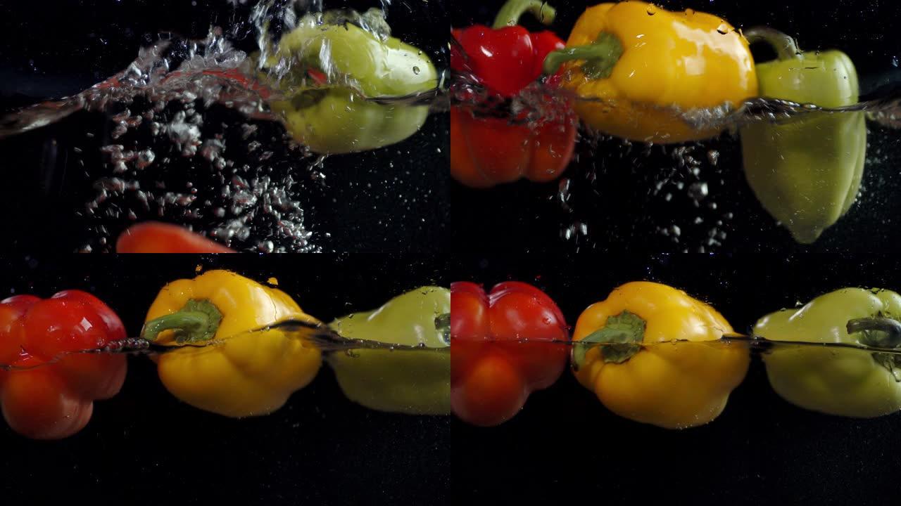 甜椒随着气泡落入水中。
