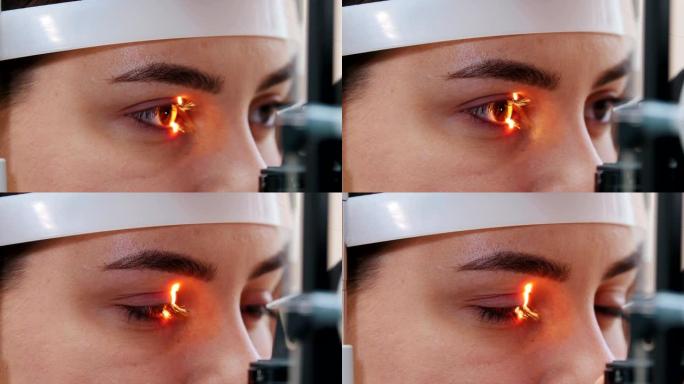 眼科治疗-一名年轻女子用特殊的大验光机检查视力-棕色眼睛颜色
