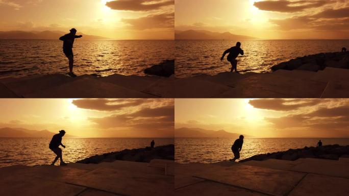 男子在日落时在海边奔跑