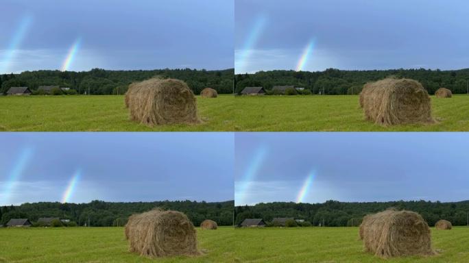 绿色农场上的双彩虹