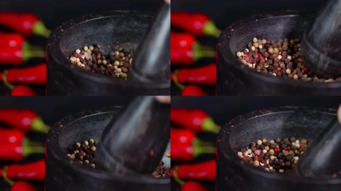 黑胡椒在研钵中磨碎。