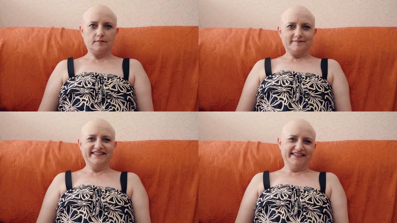 自信的患有癌症的秃头女人在镜头前平静地微笑