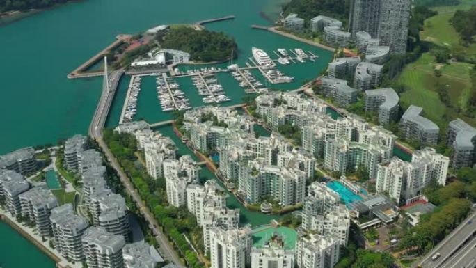 阳光灿烂的新加坡城市公寓海湾综合游艇码头码头交通道路空中全景4k
