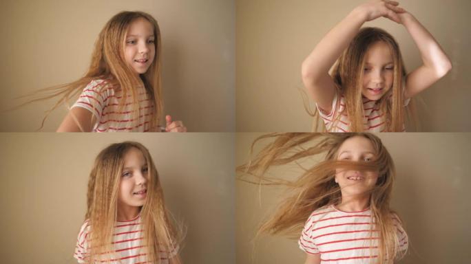 开朗的金发小女孩看着镜头，在房间里有趣地跳舞。小孩子在室内做舞蹈动作。快乐微笑的女孩子在家享受和娱乐