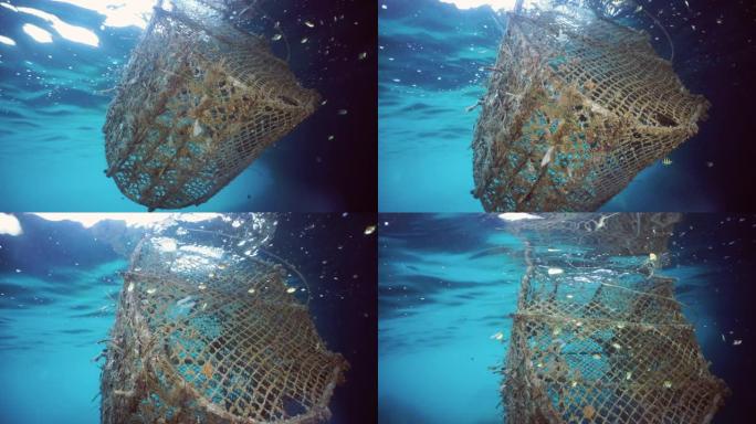 商业捕鱼业拖网在海上丢失的幽灵网污染