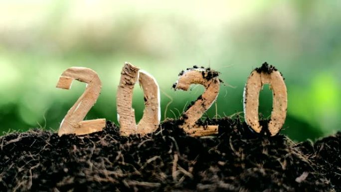 新年快乐2020社交媒体视频.2019-2020更改背景新年决议概念.地面上的木质文字.非常适合您的