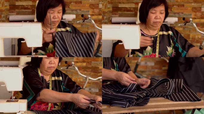 亚洲女性在家缝纫纯手工制作做裙子