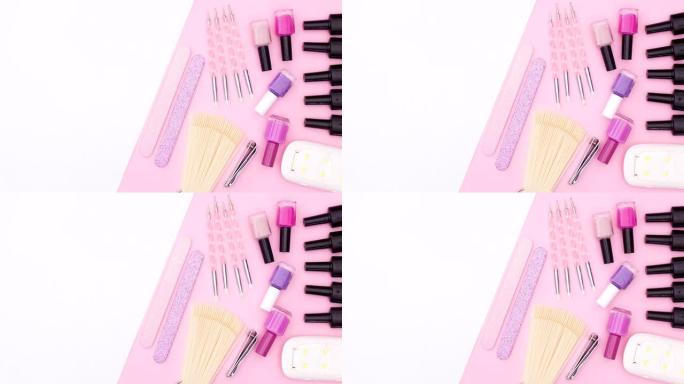 修指甲工具在粉红色的白色主题的粉红色一侧移动。停止运动