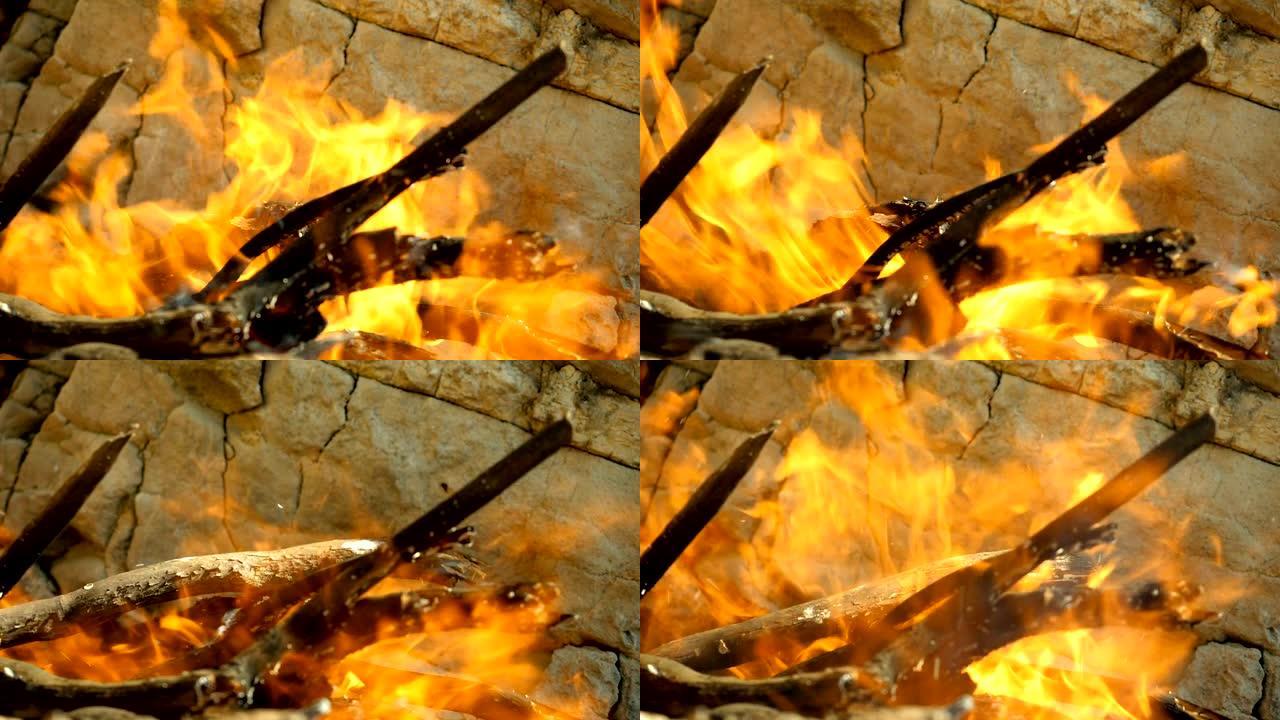 篝火。木柴的特写镜头正在火中燃烧。希腊。慢动作。高清