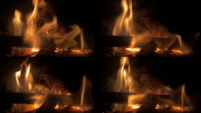 温暖的壁炉特写火舌以慢动作传播