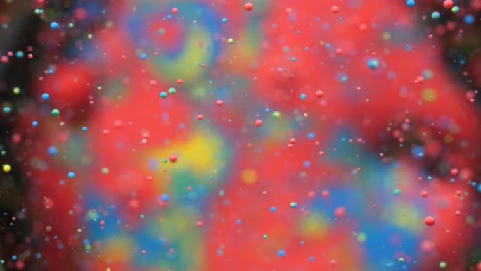 彩色气泡油美丽的油漆宇宙颜色移动五彩。太空星系行星。星云太空恒星行星。银河系。表面宇宙移动多色。假日