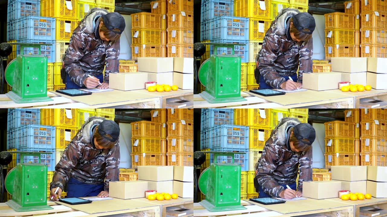 一家小型企业农场老板包装橙子，准备直接运送给客户