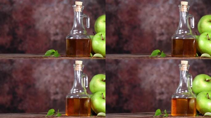 苹果醋在木桌上旋转。
