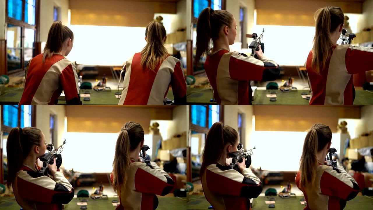 女子运动射手训练两个女孩帅气背影