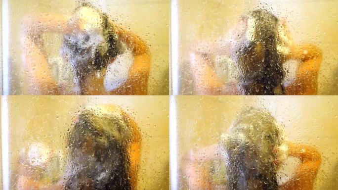 模糊的画面，一个面目全非的女人在洗澡。小女孩站在淋浴间享受着热水滴下来的感觉。美丽的女士照顾自己洗头