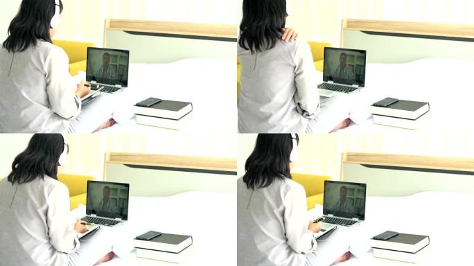 女人生病在家使用笔记本电脑通过视频会议医疗应用程序与她的医生交谈。女人检查可能的症状与专业医生。