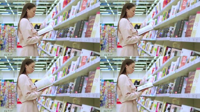 年轻女士正在商店买书