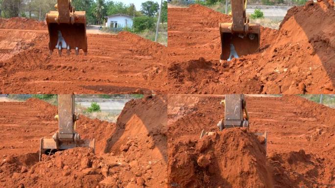 挖掘机铲斗在阳光施工现场挖土
