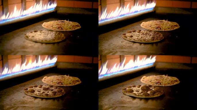 阿拉伯比萨饼在一家餐馆的煤气炉里煮。