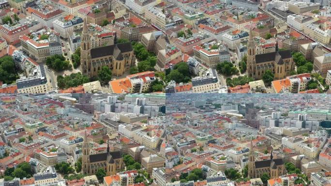 阳光灿烂的一天飞越维也纳市中心著名大教堂航空全景4k奥地利