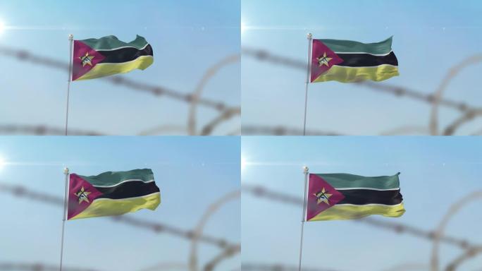 身后挂着莫桑比克国旗