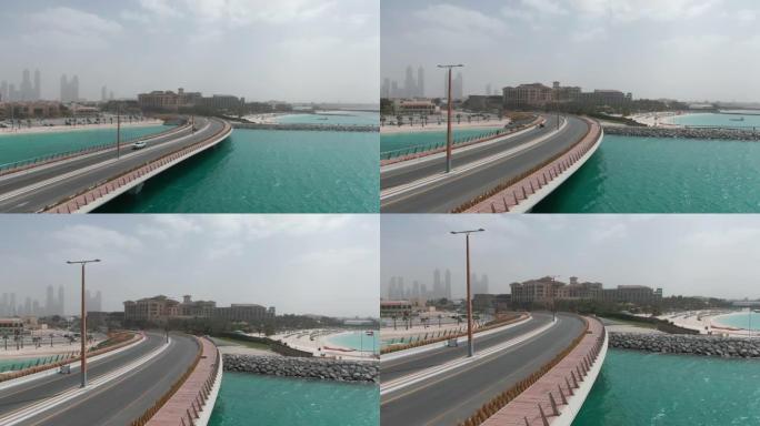 阴天下午通往迪拜宝格丽酒店的海湾大桥