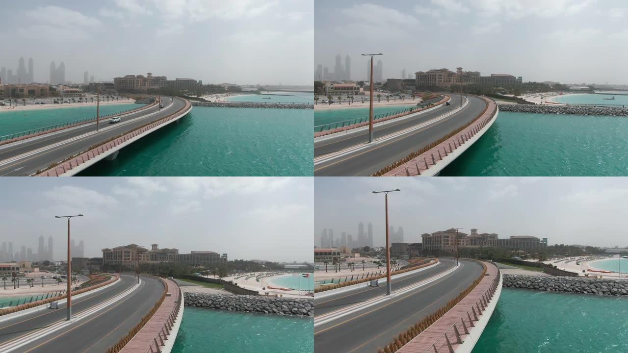 阴天下午通往迪拜宝格丽酒店的海湾大桥