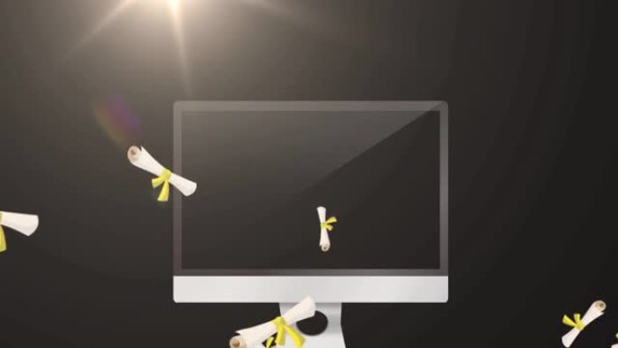 黑色背景上的多个文凭落在计算机显示器上