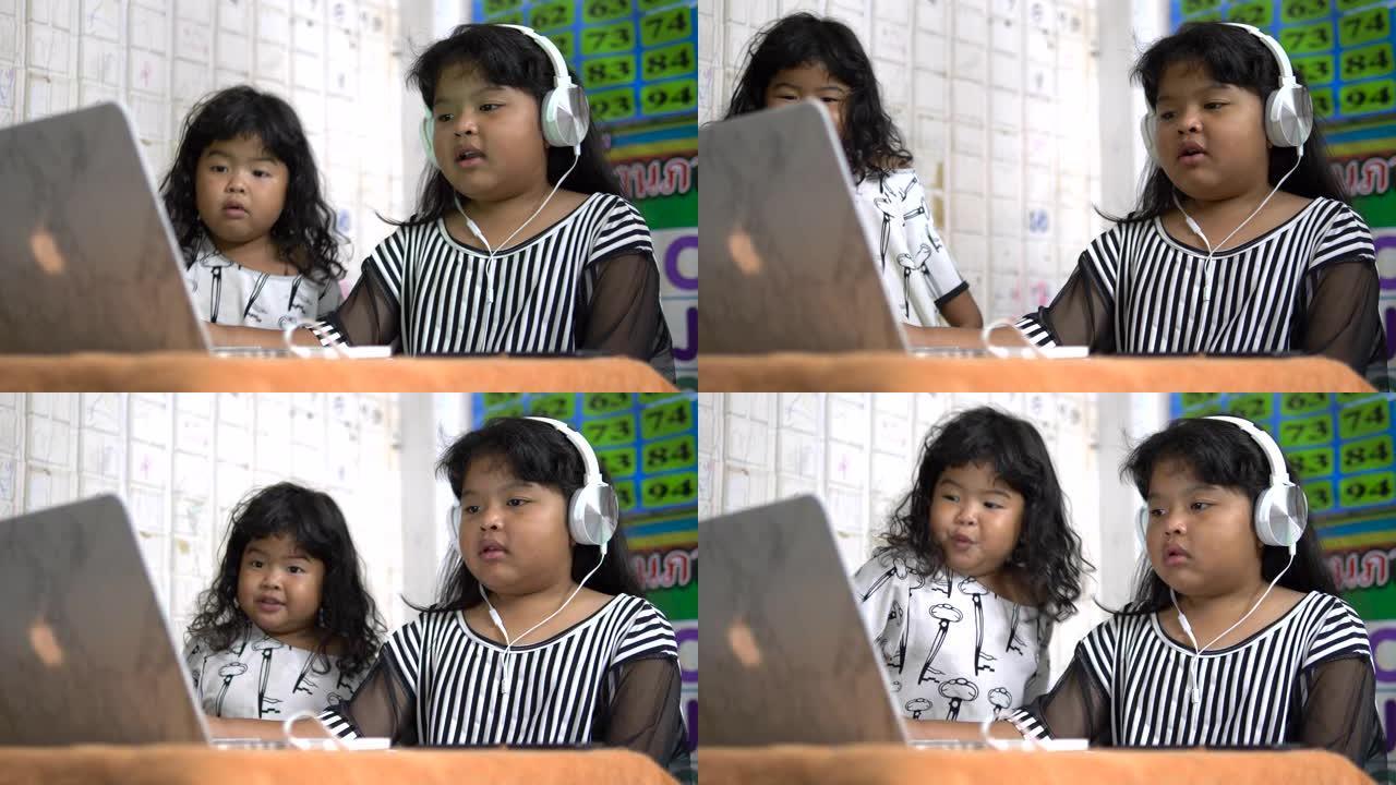 玩电脑的亚洲女孩